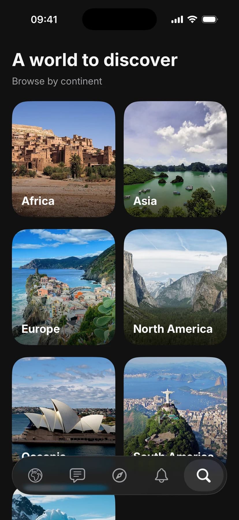The explore screen with six continent cards